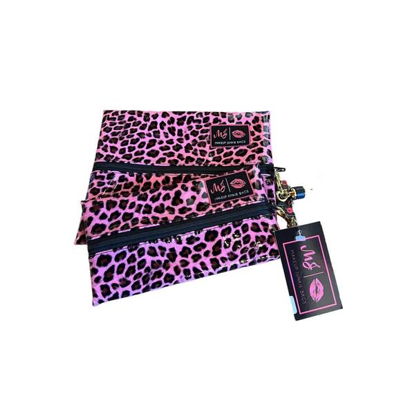 NEW MAKEUP JUNKIE BAGS leopard makeup junkie bag in patent pink - Picture 1 of 3